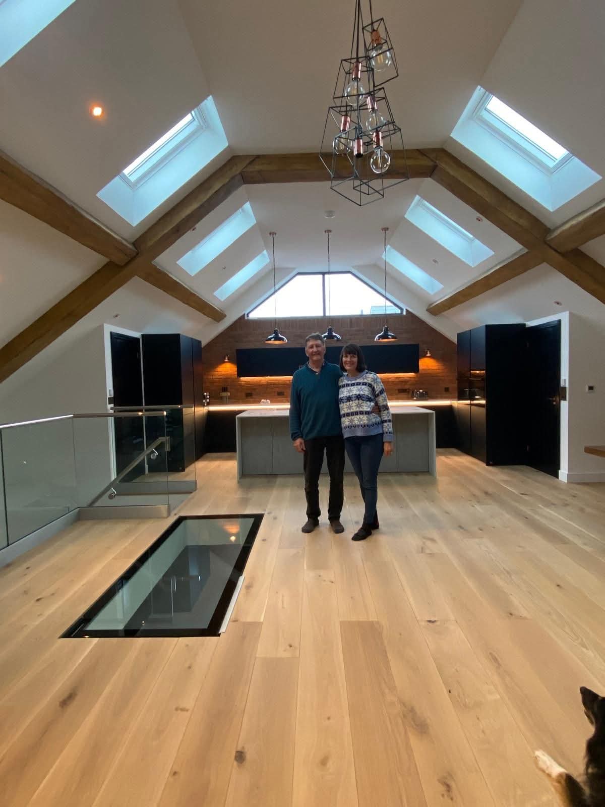 Completed vaulted kitchen with hand-finished imitation oak ceiling beams